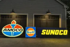 No Reserve: Three Illuminated Oil and Gas Company Signs